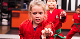 Karate Kids giving a fierce stance